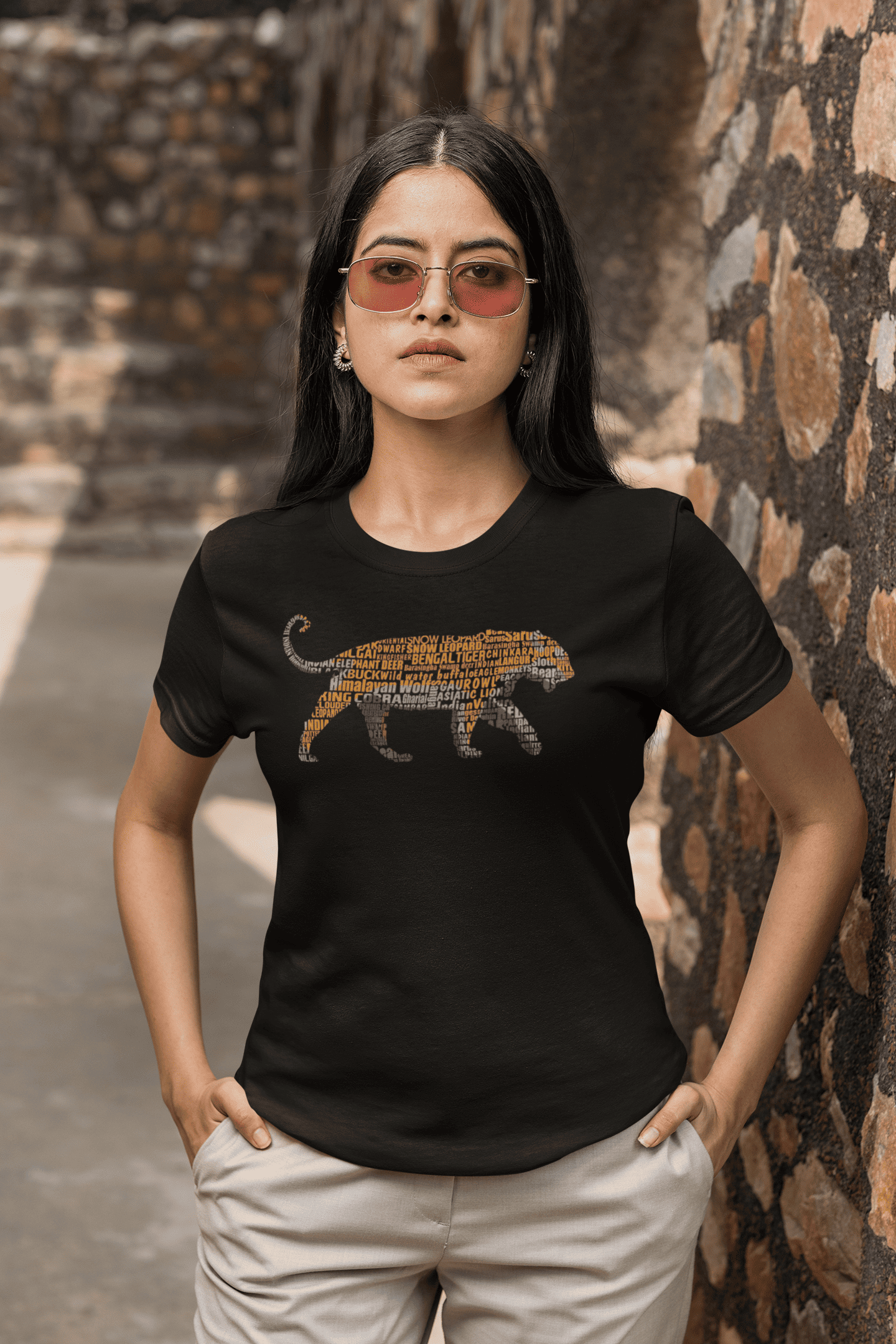 basic-t-shirt-mockup-featuring-a-serious-woman-with-sunglasses-with-her-hands-in-her-pockets-m26378